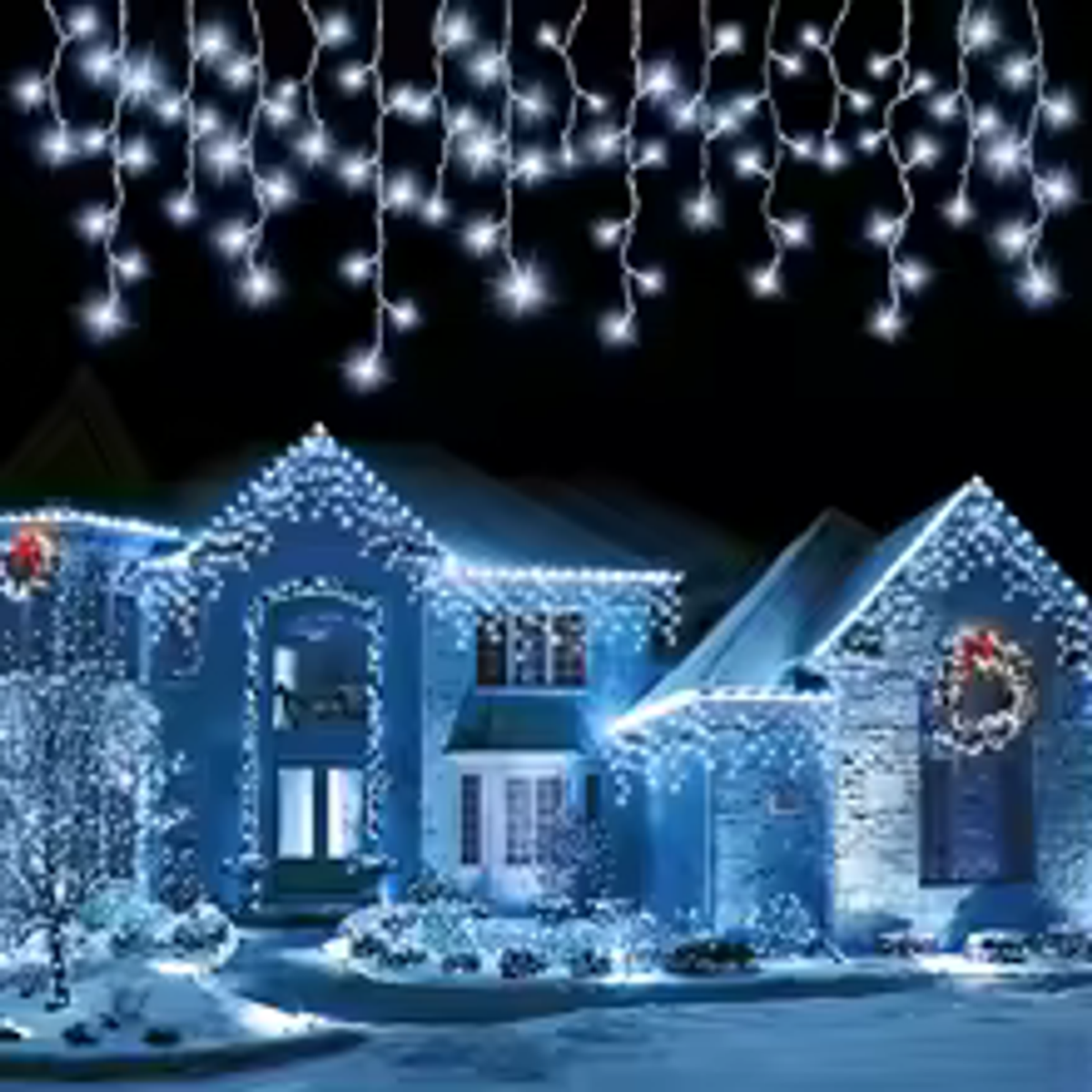 White solar icicle holiday lights on a luxury home
